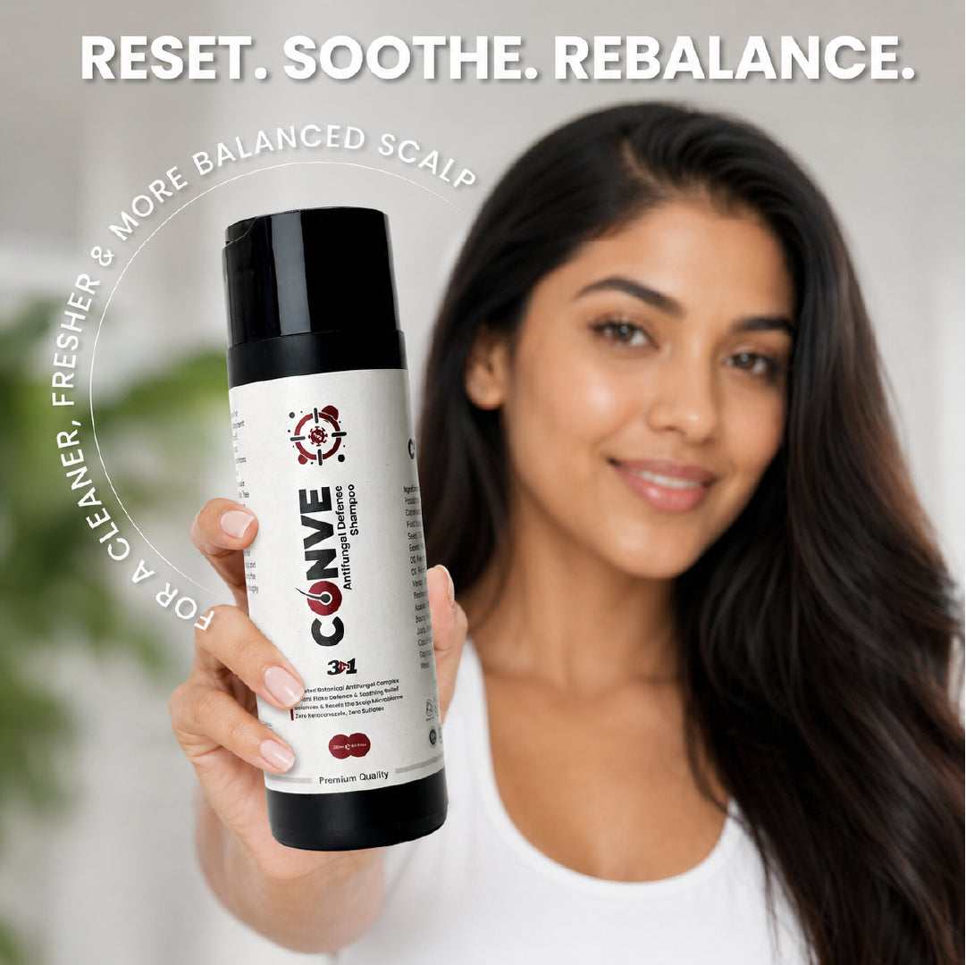 Woman holding Conve anti-dandruff shampoo for cleaner fresher and balanced scalp